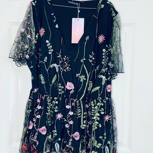 BloomChic Black Blouse with Floral Accents